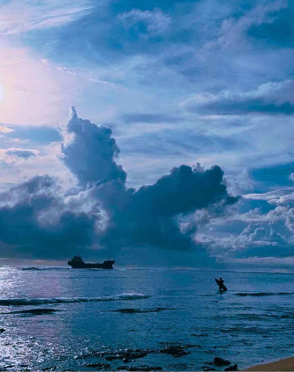 Stranded tanker off Burgos, Siargao, at dusk